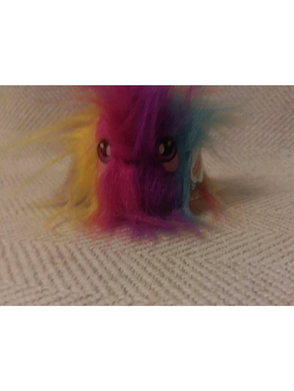 Squeezamals Squishy “FLUFFY - FURBALL” Series 2 3" Bright Rainbow Colored Toy